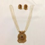 white-beads-with-golden-pendent