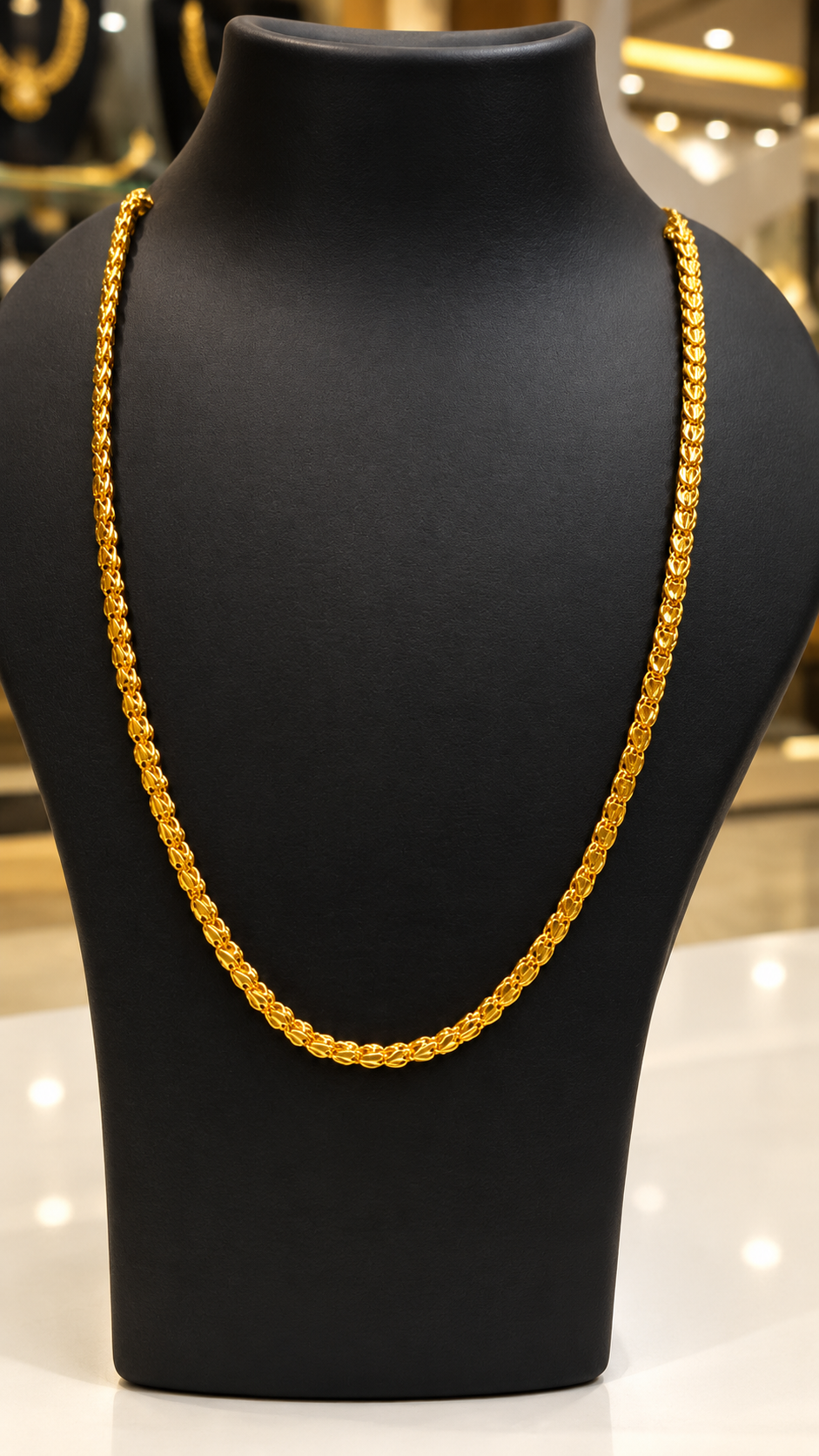 Gold plated chain 30 inch on black display bust